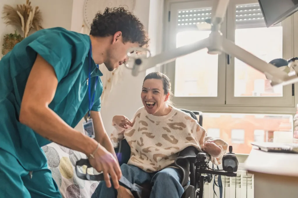 Nurse with disabled woman in wheelchair