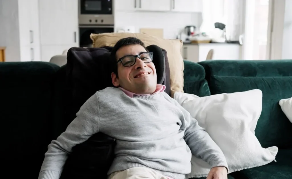 Disabled man smiling at camera